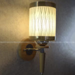 Simple Wall Lamp With Cylindrical Lamp Shade and Wooden Canopy - Image 2