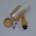 Simple Cylindrical Amber Glass Wall Lamp With Wooden Canopy - Image 2